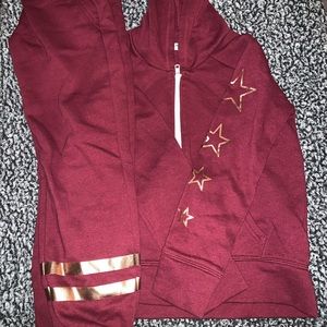 A sweatsuit (sweatpants and matching hoodie)